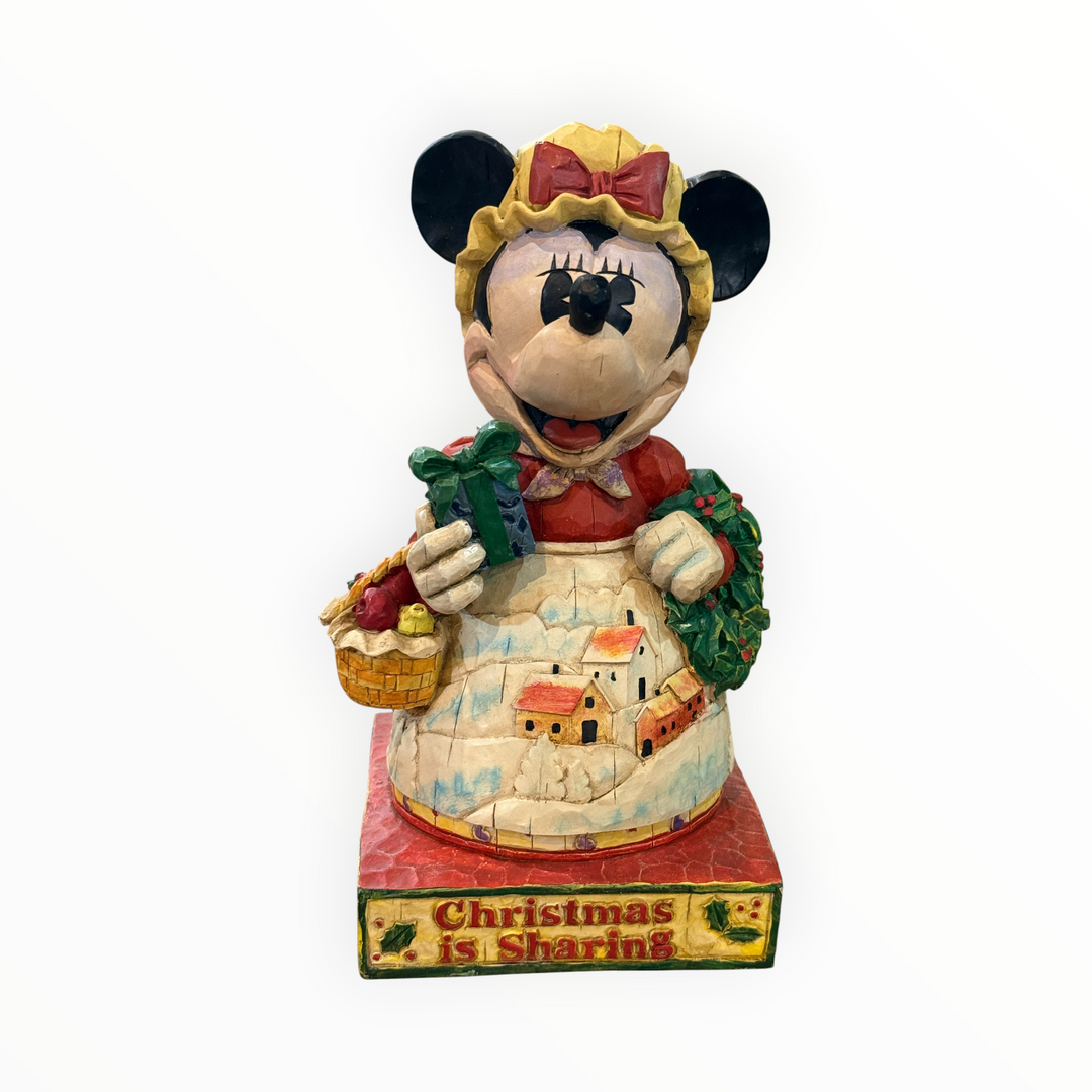 Jim Shore Disney Traditions figurine titled "Heartwarming Holiday"