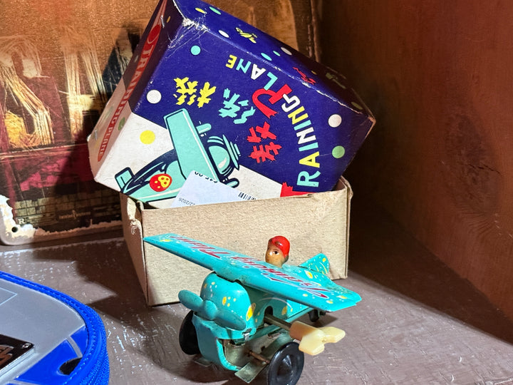 Vintage teal "Training Plane" Tin Toy