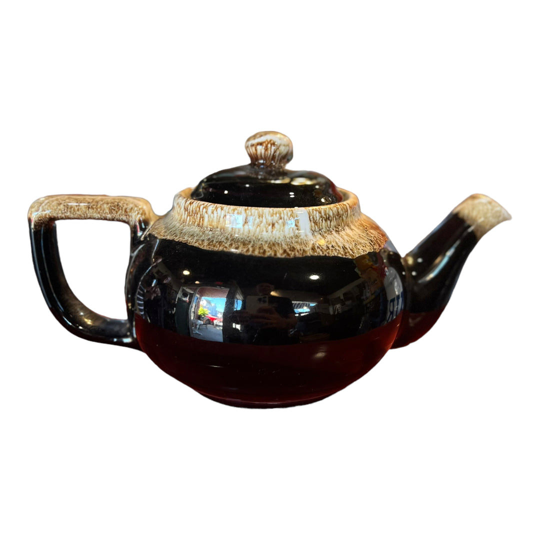 Brown teapot with brown drip glaze