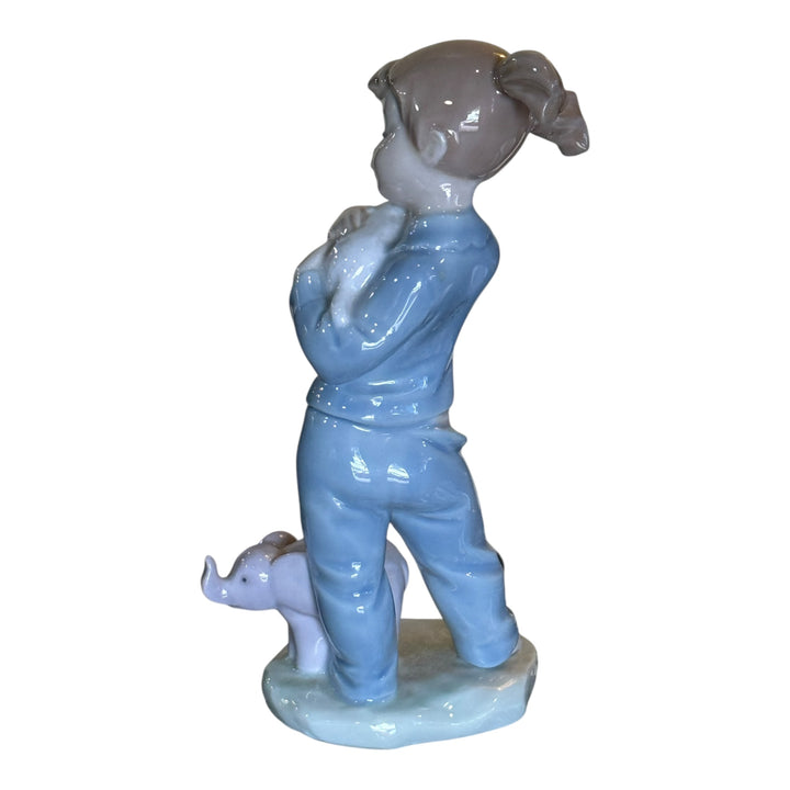 Nao By Lladro Girl Holding Lamb With Toy Elephant