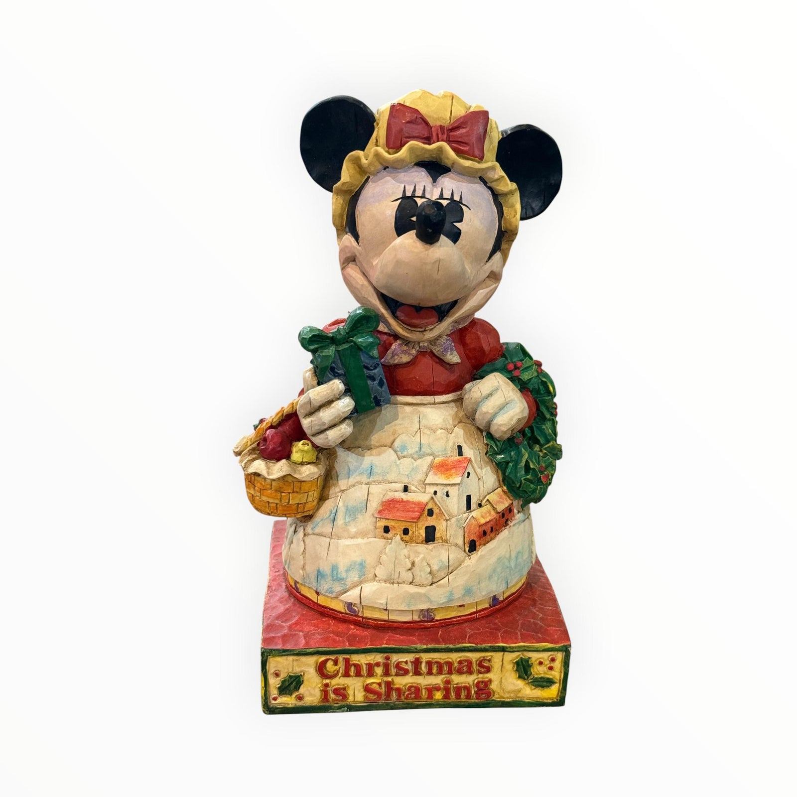 Jim Shore Disney Traditions figurine titled "Heartwarming Holiday"