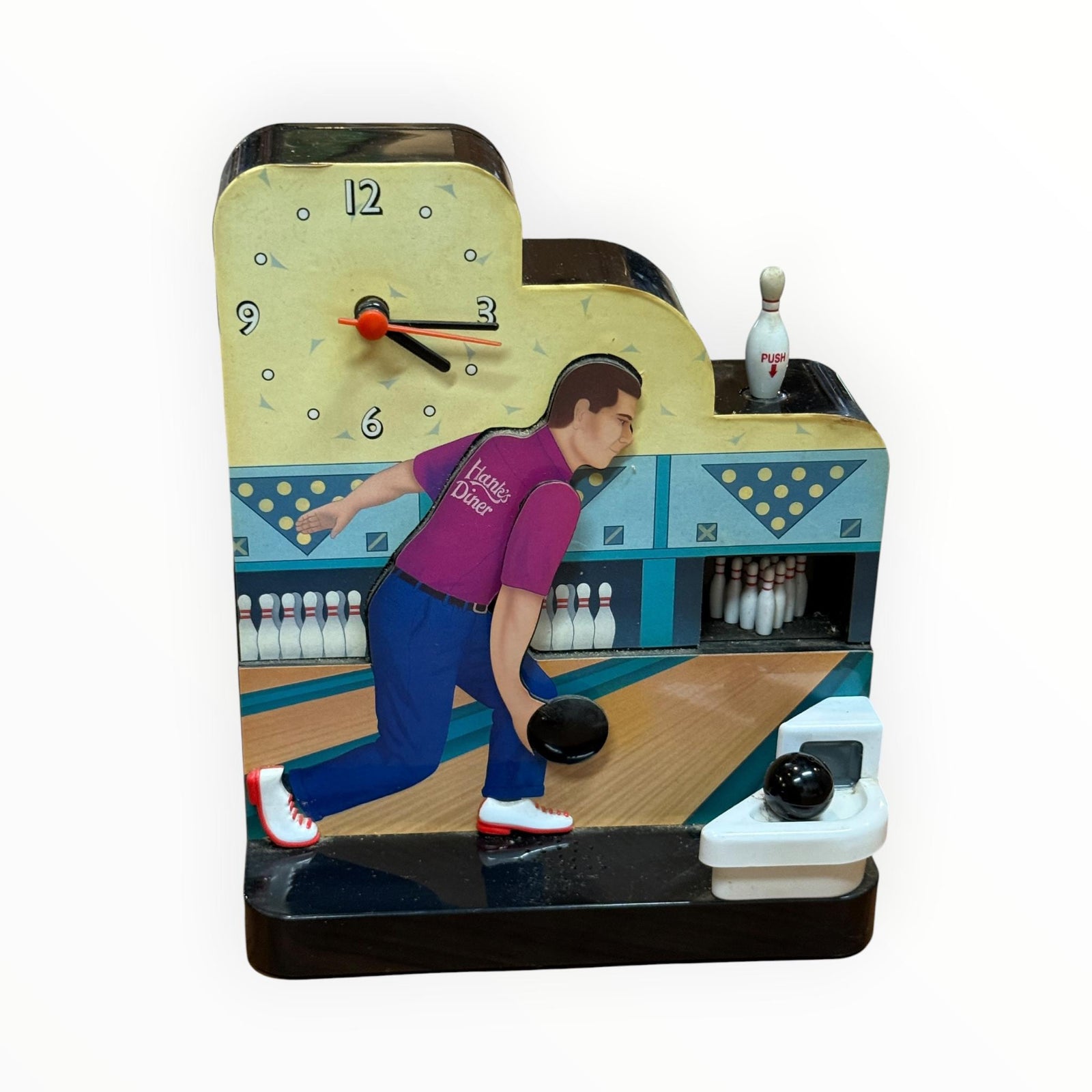 This item is a 1998 "Original Bowling Clock" manufactured by Fun-Damental Too